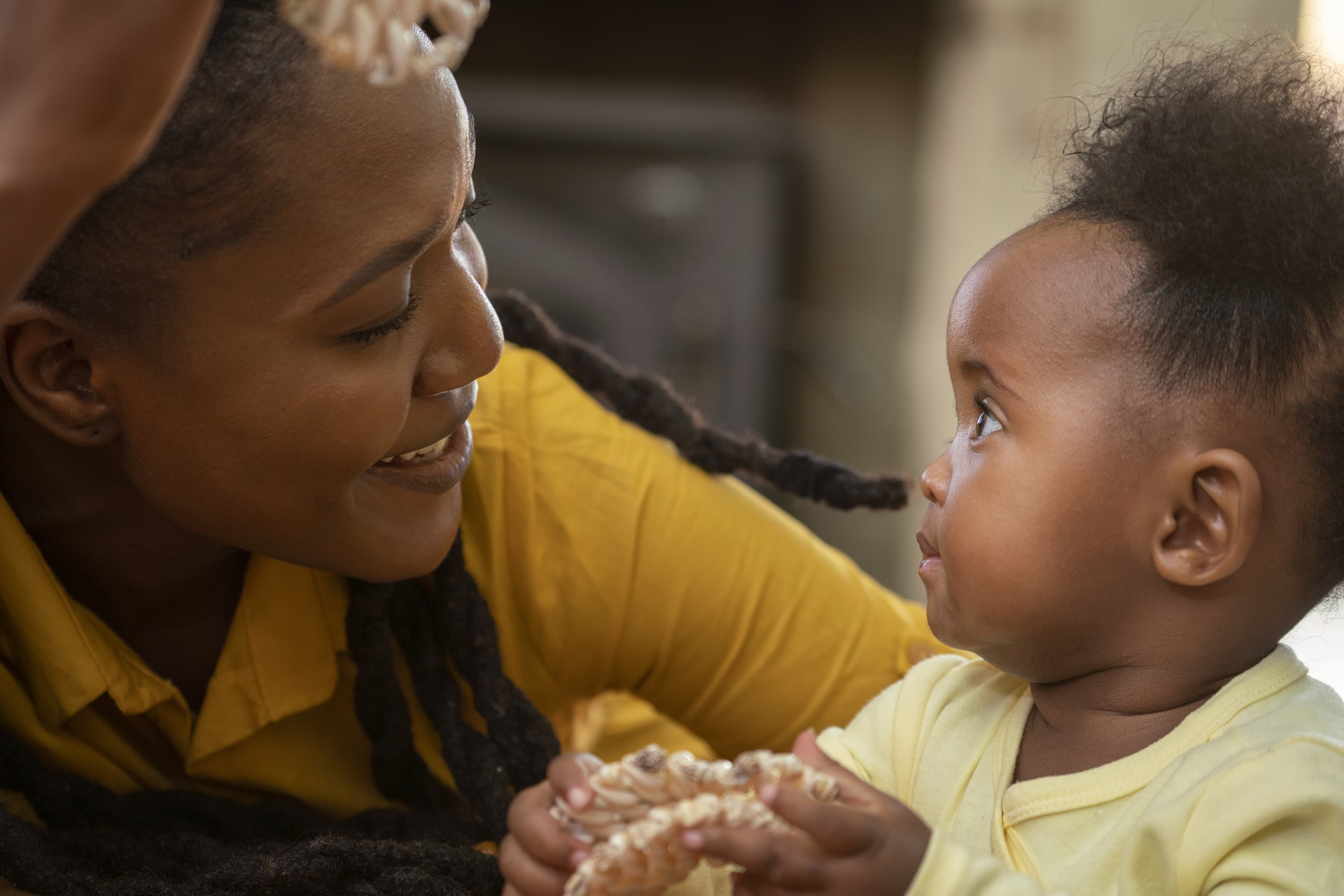 cute-black-baby-home-with-parents