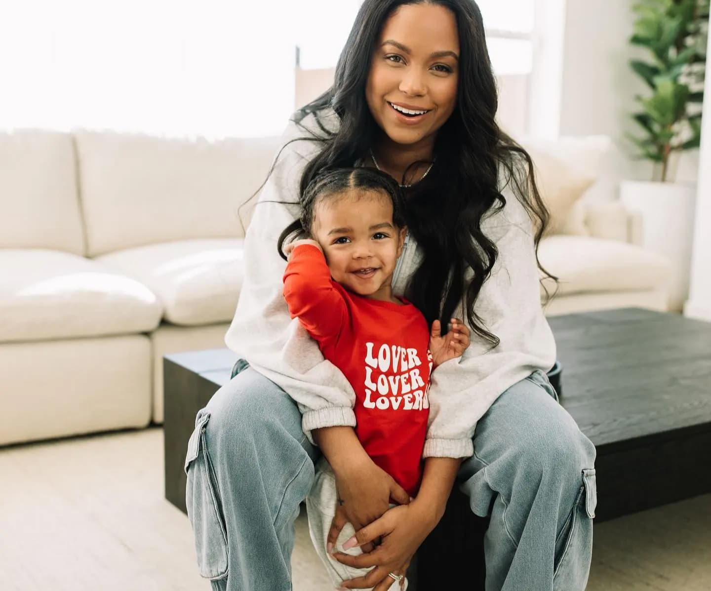 A smiling mother and child